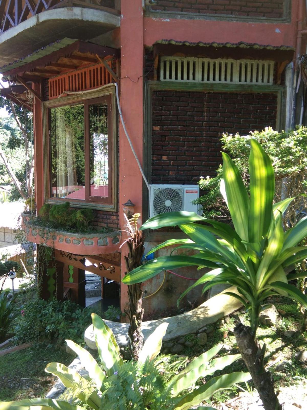 Junia Guesthouse Bukit Lawang Exterior photo